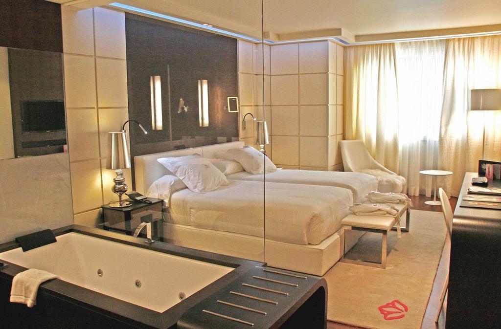 โรงแรมกรัน นาการิ บูติคแอนด์สปา วิโก ภายนอก รูปภาพ A room at the Mandarin Oriental, Milan